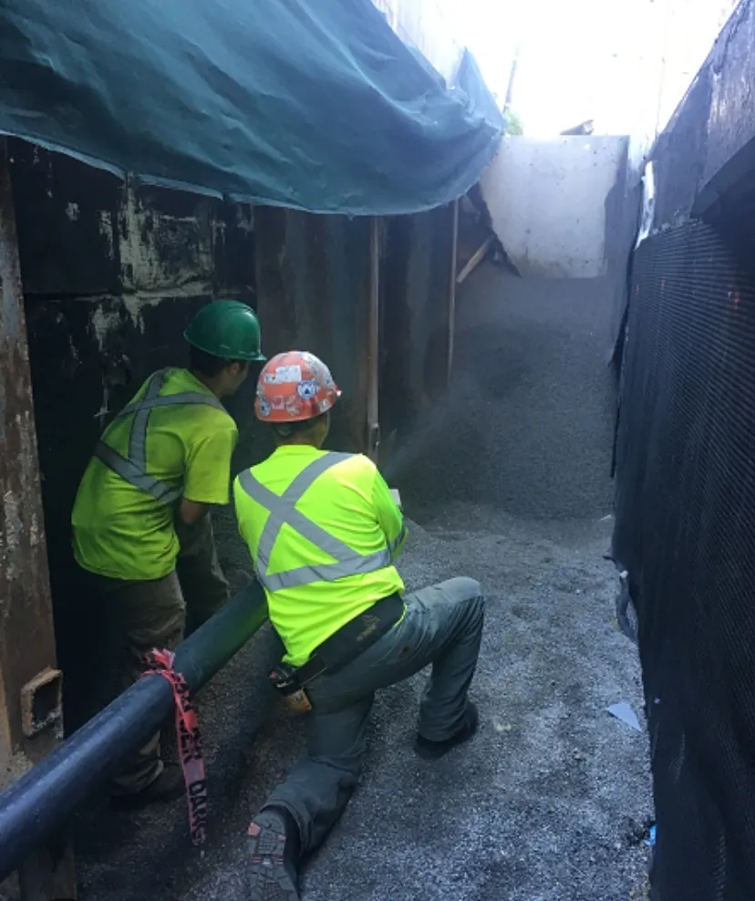 Sewer repair crew replacing a sewer line under a slab in Miami-Dade, FL